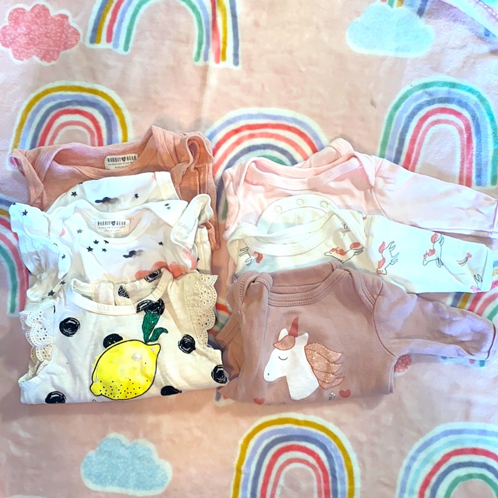 Lot of baby onesies gently used very adorable and soft! 3 long sleeve